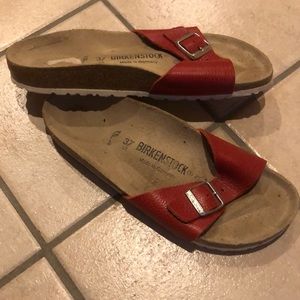 Red single strap Birkenstock’s
